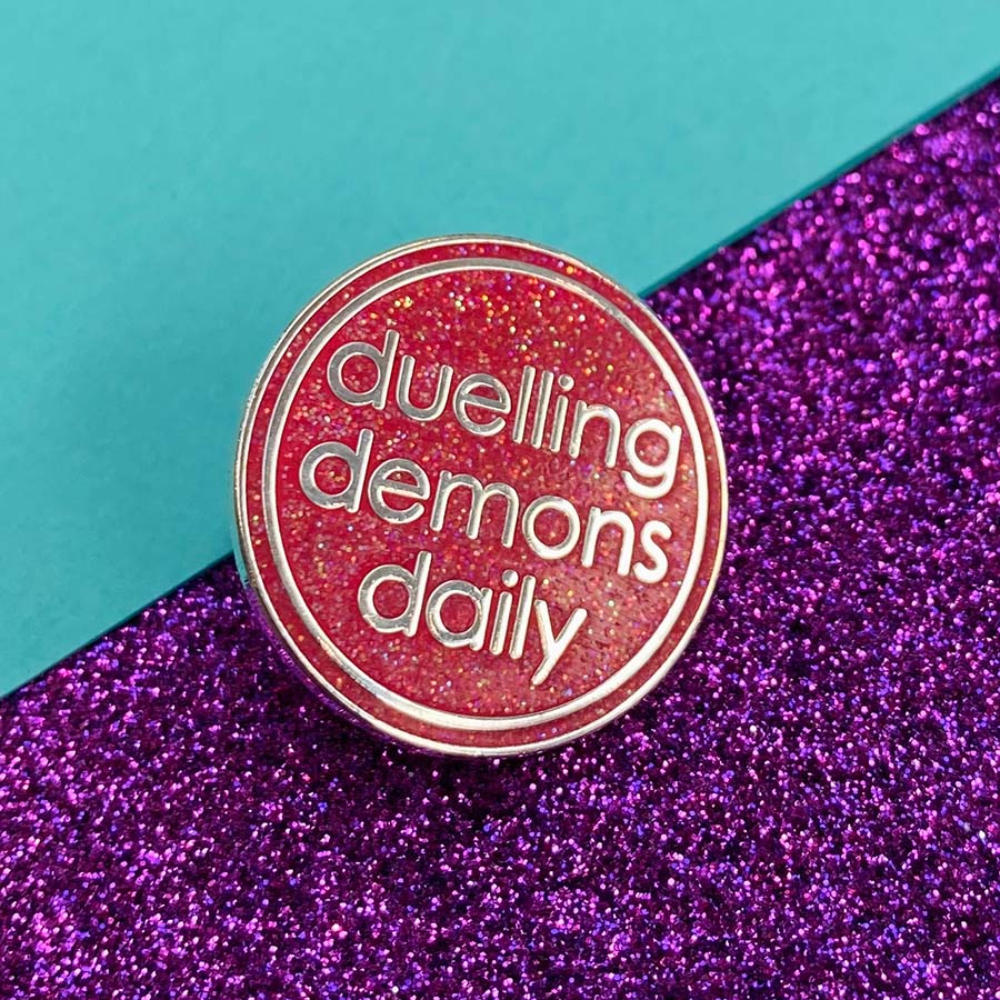 Duelling Demons Glitter Enamel Pin