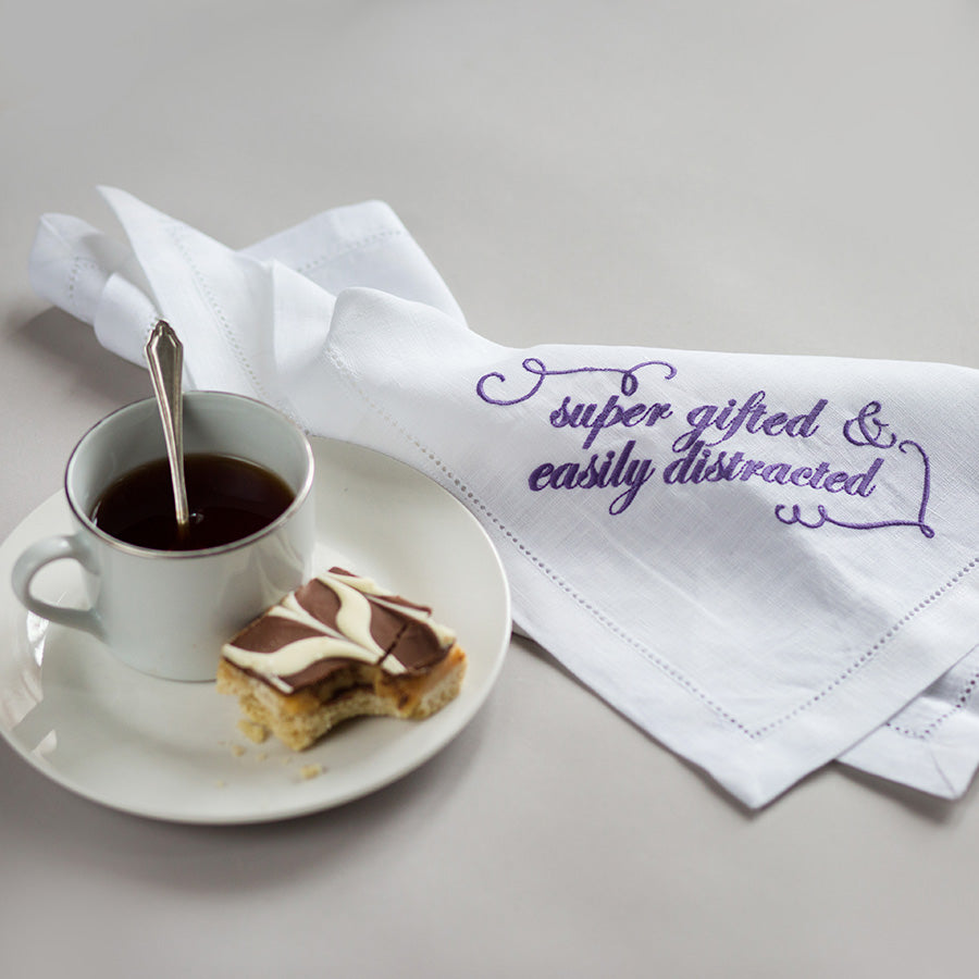 Set of Six French Linen Embroidered Slogan Napkins
