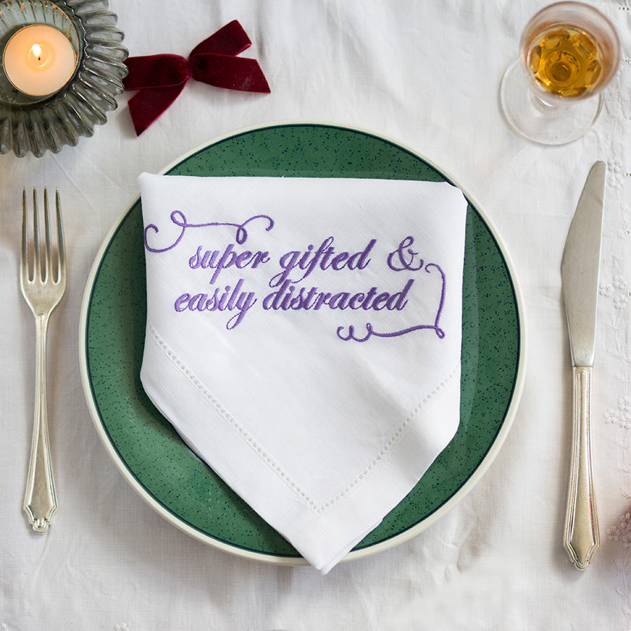 Set of Six French Linen Embroidered Slogan Napkins