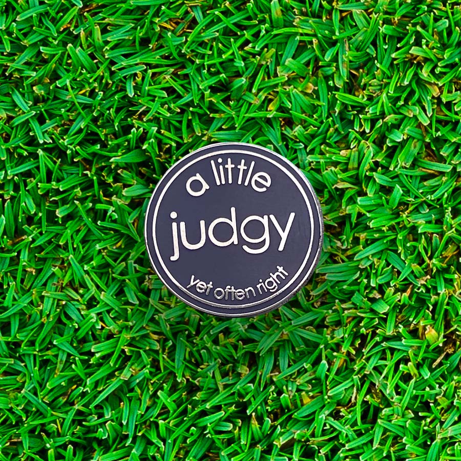 A Little Judgy (yet often right) Golf Ball Marker