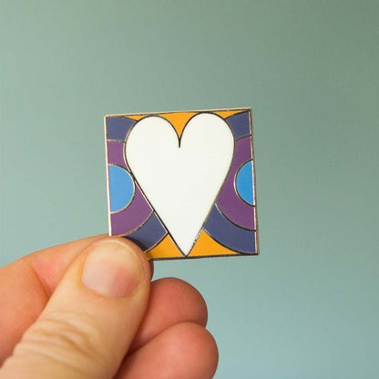 Wear your heart on your sleeve or your lapel or your bag. This is a beautiful heart pin that will elevate your pin collection beyond all expectations!