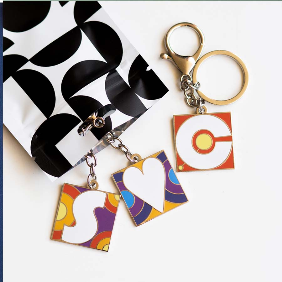 Sharing Keyrings with Mates letters and numbers and heart symbols on sturdy keyrchains.