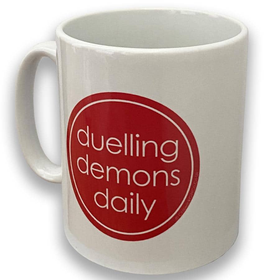 Duelling Demons Mug
